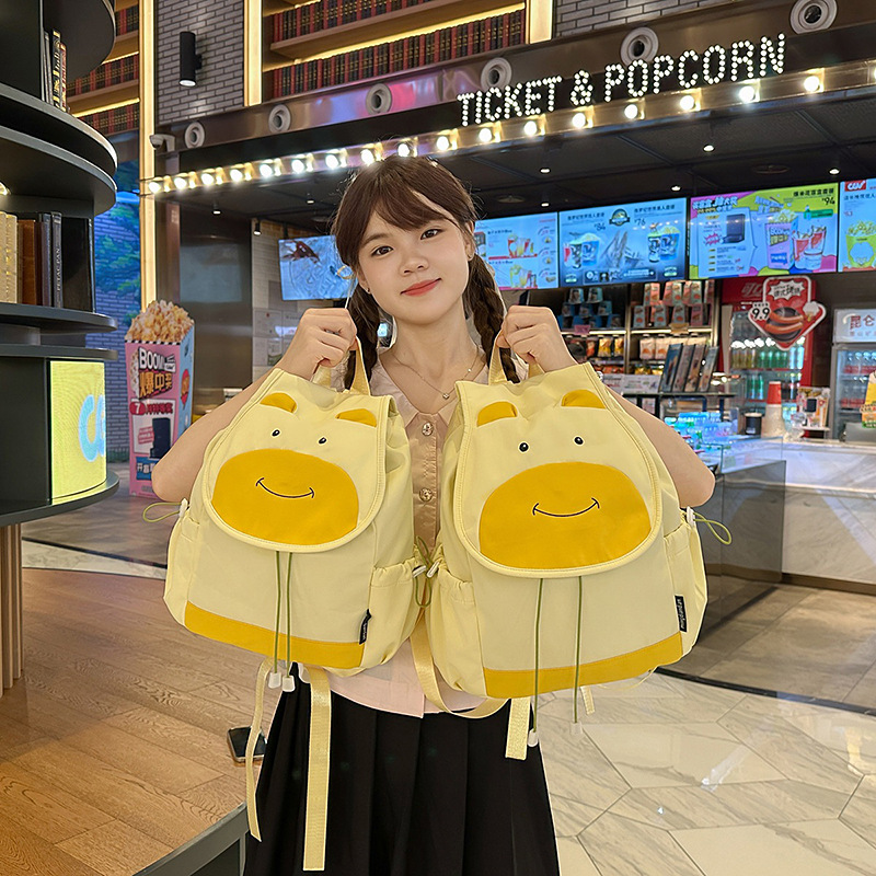 Mochila de niña de vaca linda, mochila de dibujos animados de gran capacidad, mochila extraña, literatura y arte fresca, mochila de estudiantes universitarios.