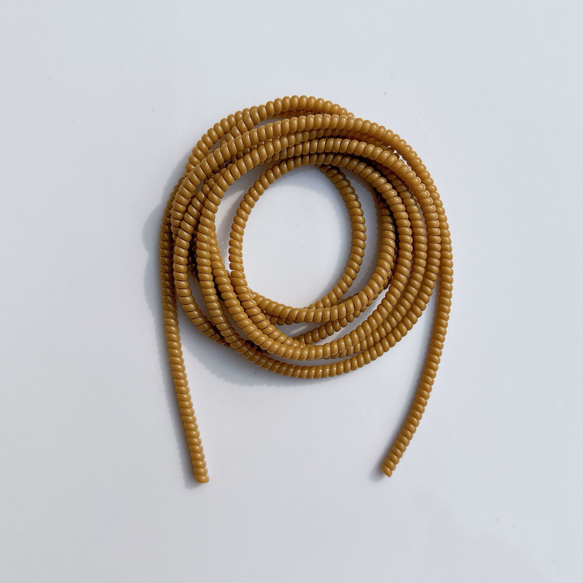 1.4 Cuerdas de protección de color sólido de 1,6 metros de cable de datos para línea de teléfono celular anti-ruptura cargador de cable de bobinado