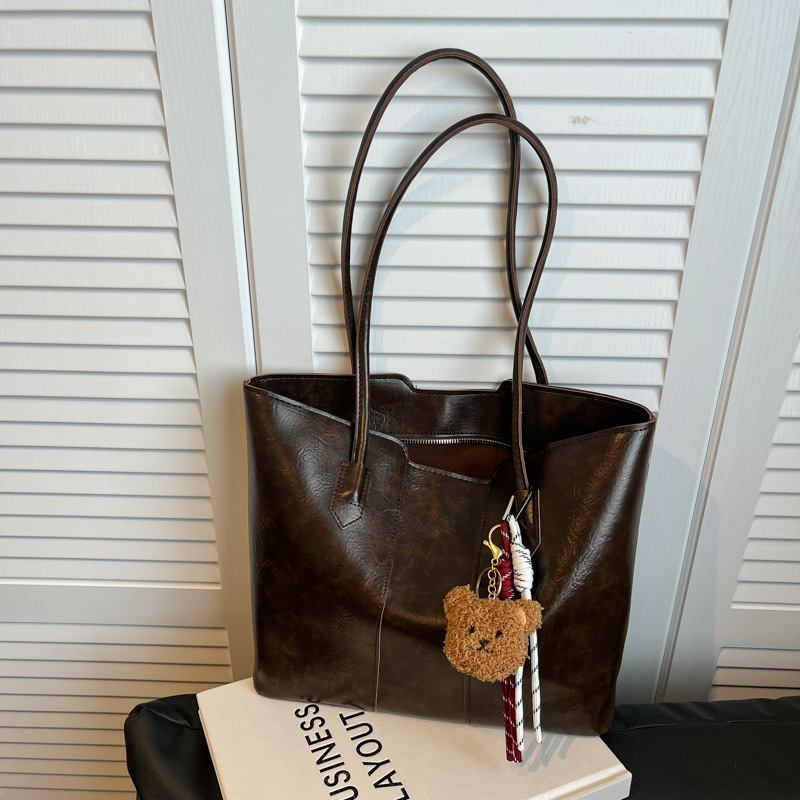 Bolso de gran capacidad de viajero de temperamento de alta gama para mujer 2024 nuevo otoño e invierno bolso de hombro de lujo ligero bolso de ocio