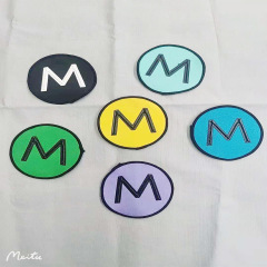 New stylish 3D offset printing M letter edge round logo clothing hats boxes bags socks DIY decoration matching fabric tags