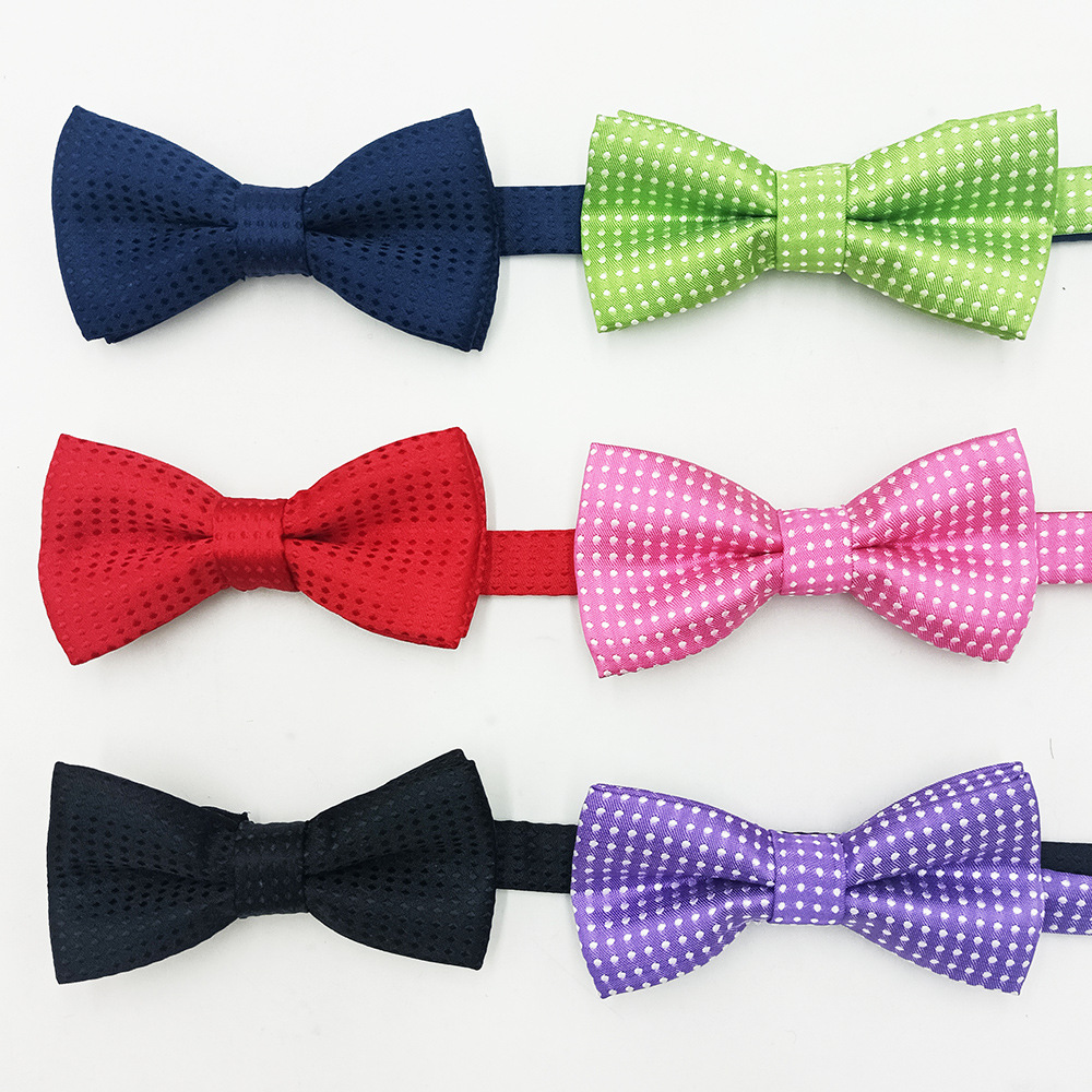 Lugar del fabricante Versión coreana de la pajarita para niños de doble capa para estudiantes de primaria hilo de poliéster teñido en hilo de seda color sólido accesorios para mascotas lazo