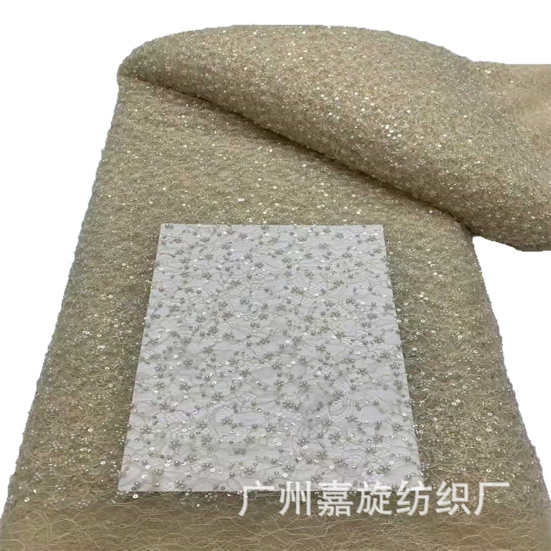 Explosiones de bordado suave encaje de arroz flor de ciruela + pequeño vestido de boda de tubo largo cheongsam tela de encaje francés