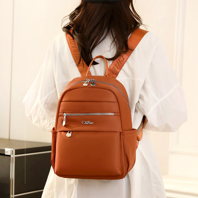 Mochila tendencia transfronteriza 2024 primavera nueva mochila para mujer bolsa de viaje informal mochila escolar para estudiantes bolsa de tela de nailon