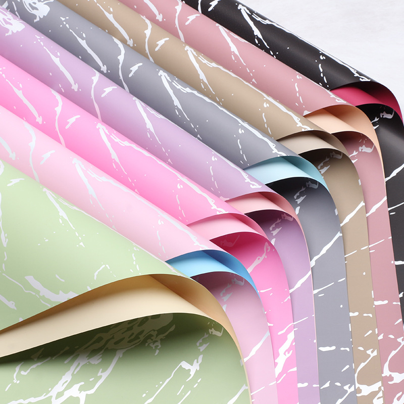 Huaxi Ouya Paper Mármol Papel de embalaje de flores Impresión engrosado Papel de flores impermeable Florería Ramo de flores Embalaje floral