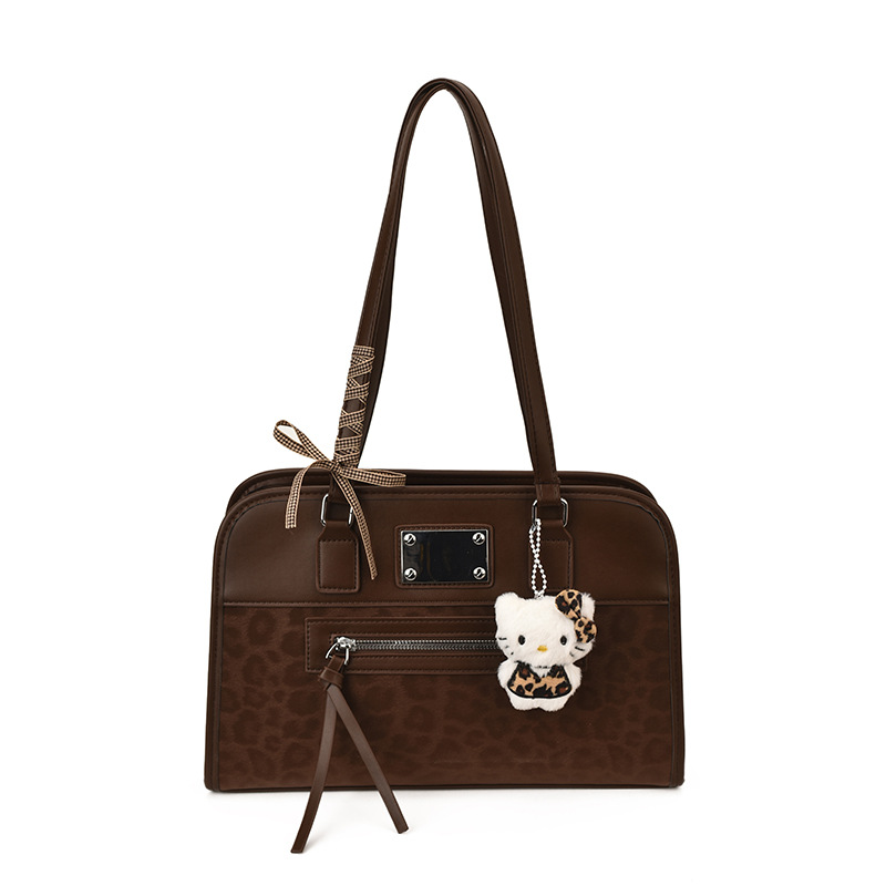 Retro leopardo hombro bajo la braza, la versión coreana de la mochila casual Zhongqi 2025 nuevo bolso de mano