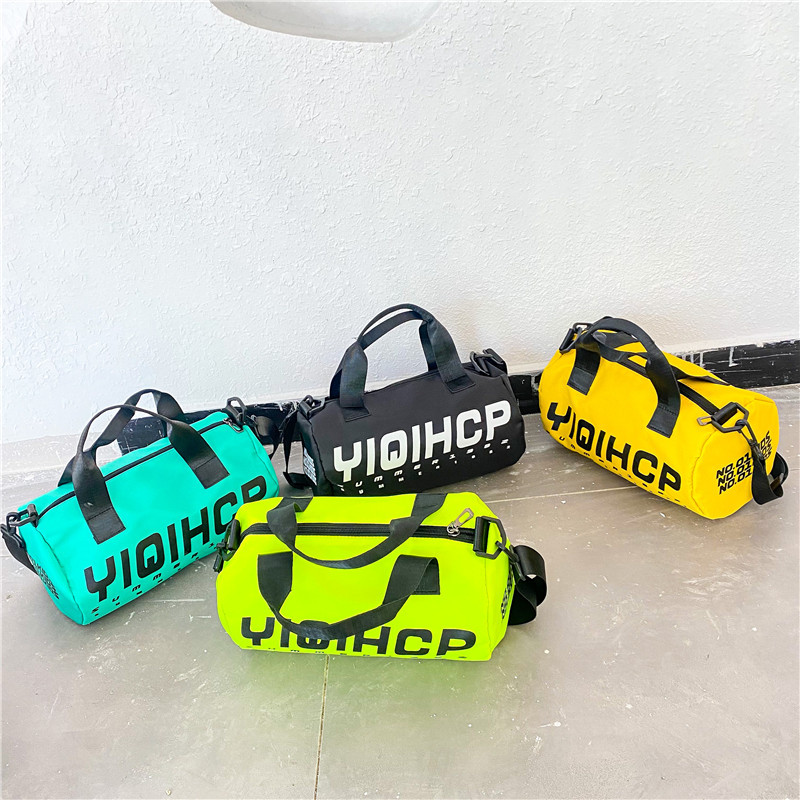 Nuevos niños de estilo Coreano carta bolsa de mensajero niños y niñas bolsa de viaje de lona portátil de gran capacidad de ocio bolsa de deporte