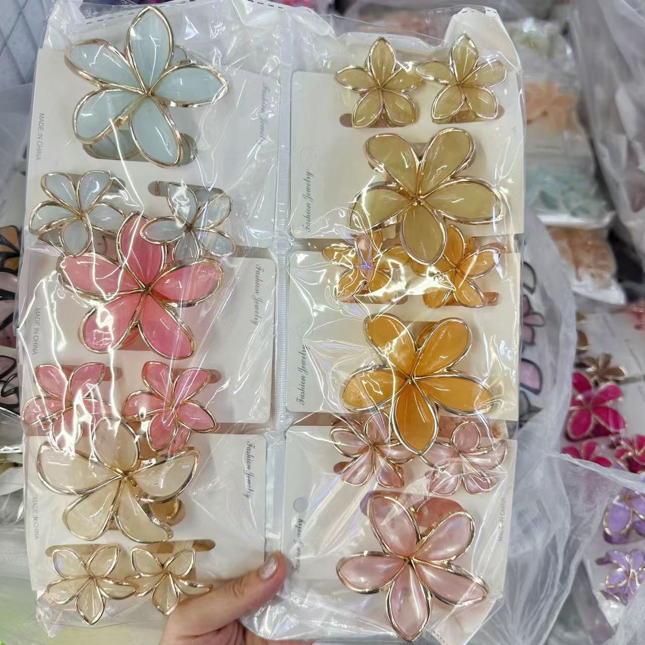 Europa y los Estados Unidos explotaron 8CM huevo flores clip de cabello de alta calidad para mujeres agarrar el cabello de tiburón color caramelo transfronterizo agarrar clip de cabello