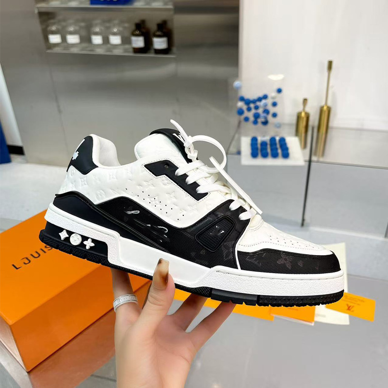 Zapatos de moda europeos Guangzhou de alta versión驴 entrenador zapatos deportivos ociosos de cuero universal para hombres y mujeres