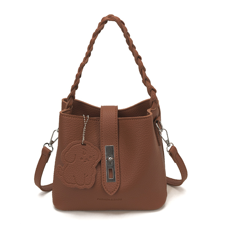 La sensación cotidiana de la versión coreana de la moda nicho bolso mujer 2026 nuevo mochila de hombro de un solo cubo de viaje bolsa temperamento