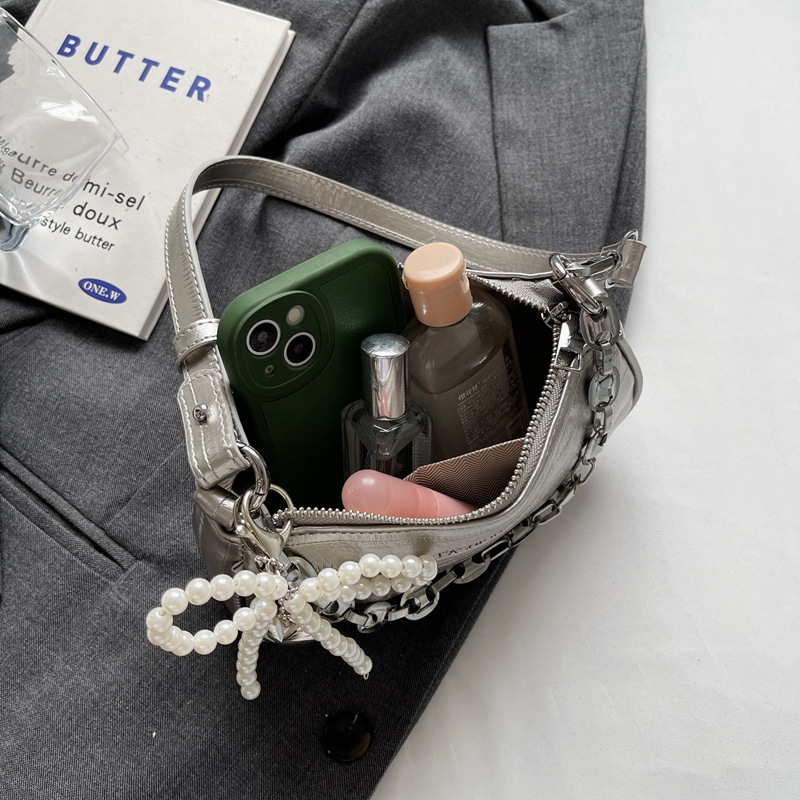 Nueva moda de verano de hombro bajo la braza 2024, bolso de moda simple, bolso de mano de cadena universal