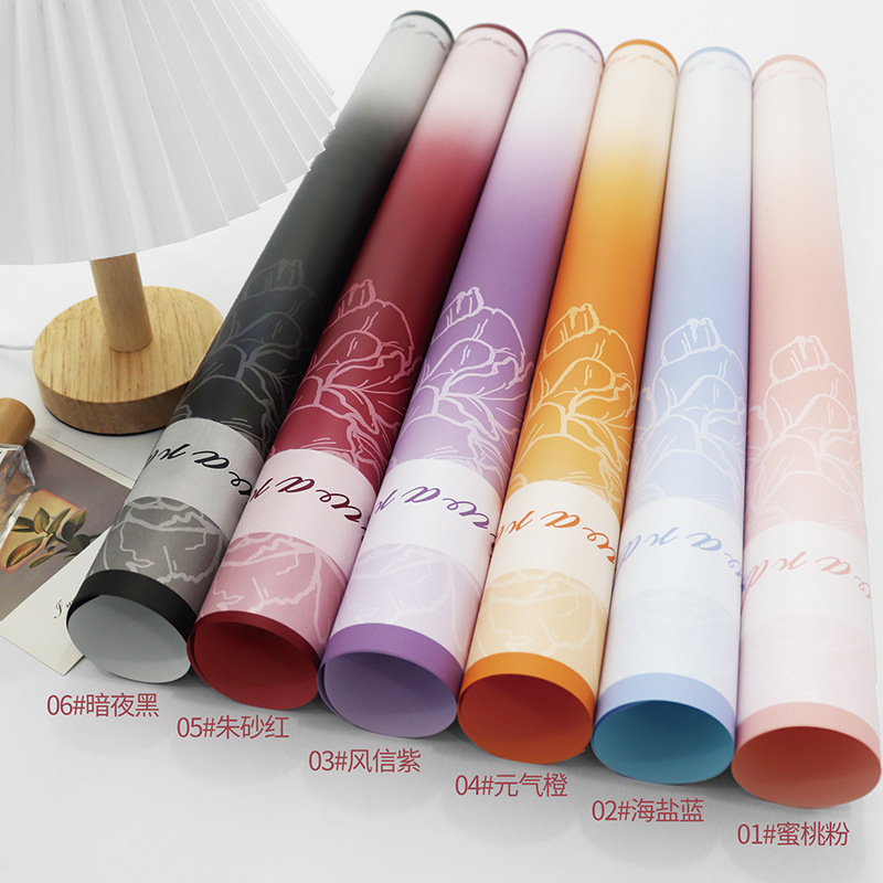 Huaxi amor fábrica de flores al por mayor papel de embalaje impermeable gradiente florista sensación de alto nivel de papel de envoltura de flores ramo
