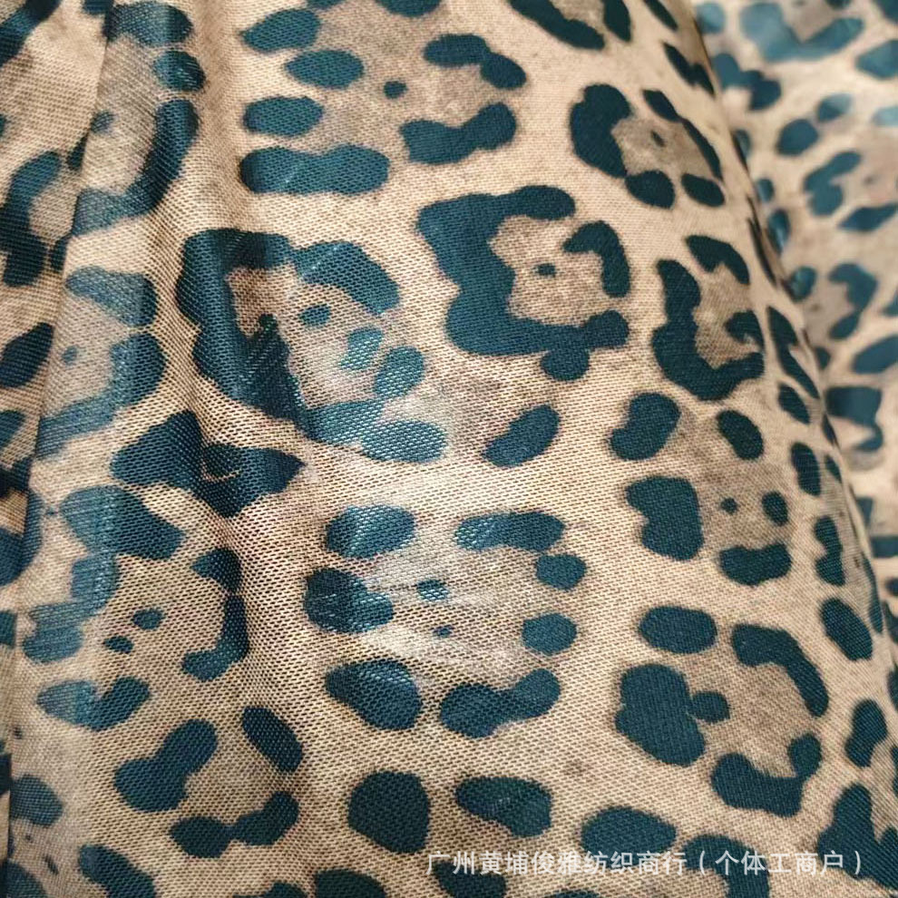 俊雅纺织-经典豹纹网纱印花-欧美野性动物印花时尚服装面料
