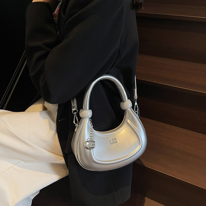 Bolsos de diseño de nicho de tendencia transfronteriza para mujer 2025 nuevo bolso de hombro retro salvaje bolso de axila de moda occidental