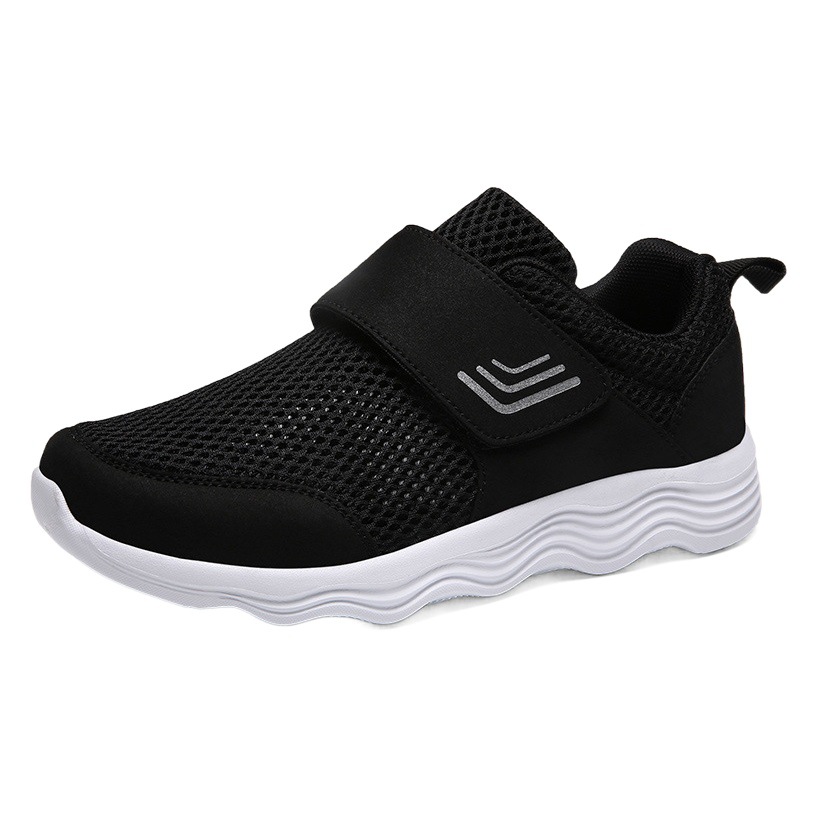 Transfronterizo de los hombres y de las mujeres que vuelan los zapatos que caminan tejidos de la zapatilla de deporte respirable de la primavera y del verano bajo-top slip-on velcro hueco zapatos corrientes de la malla