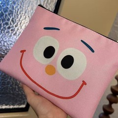 ピンクのスマイリーフェイス多用途ニッチインインターネットセレブオリジナル多用途かわいい甘い学生手持ち化粧品バッグ韓国語版