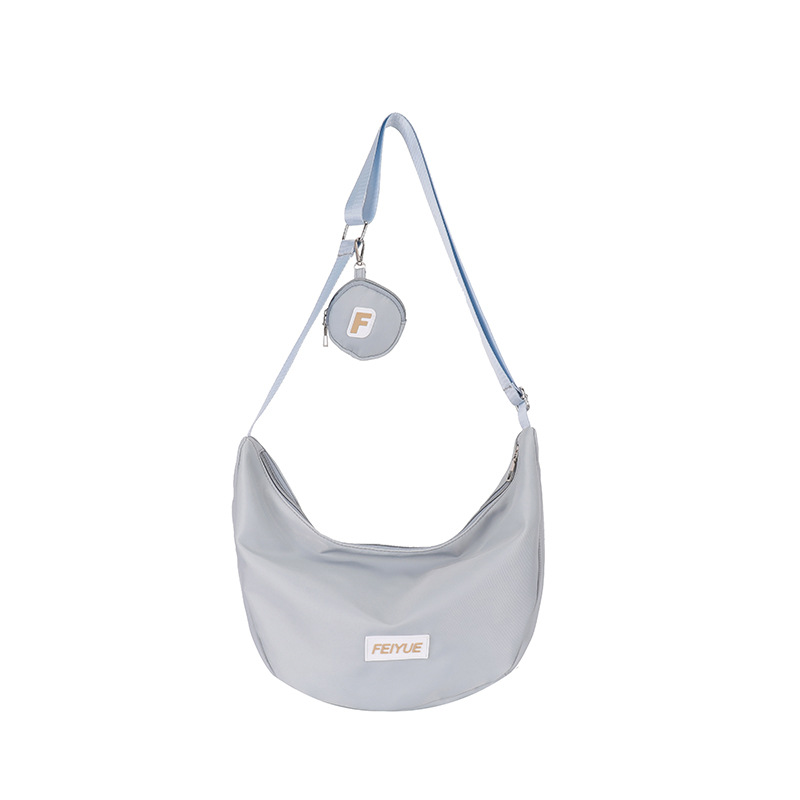 Bolsa de bolinillos de gran capacidad 2025, primavera nueva bolsa de viaje, bolsas de hombro inclinadas para estudiantes universitarios.