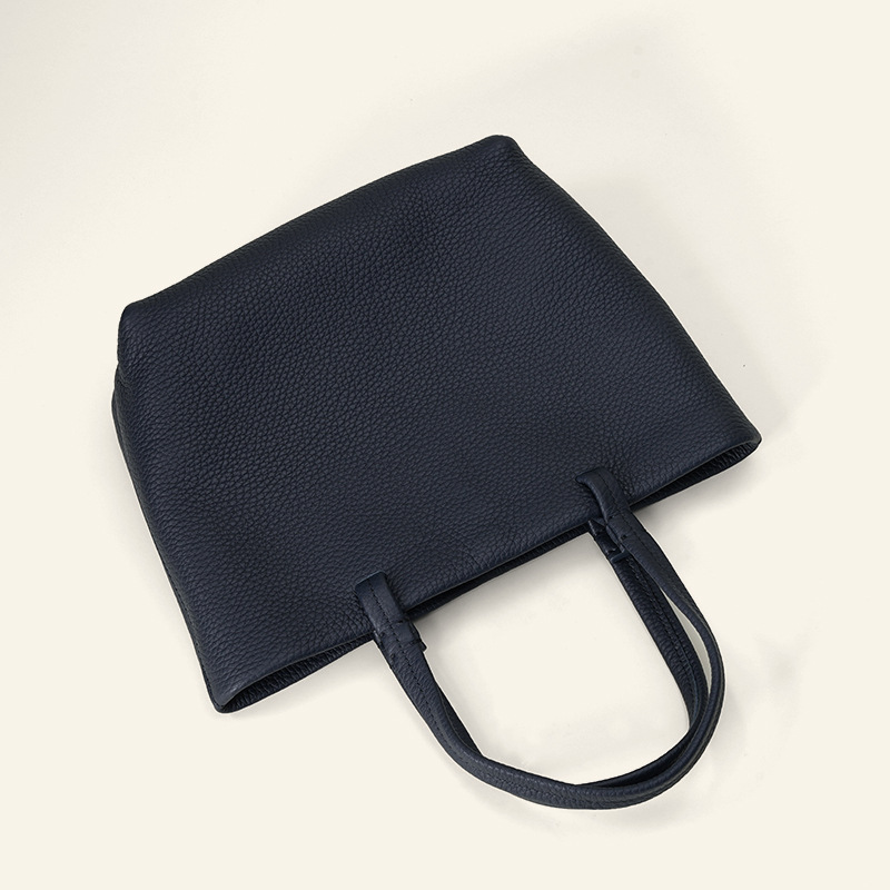Capacious bag, genuine leather