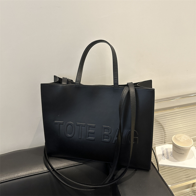Bolsa de moda coreana de nicho para mujeres 2024 nueva bolsa de clase de estudiantes de gran capacidad, bolsa de hombro universal
