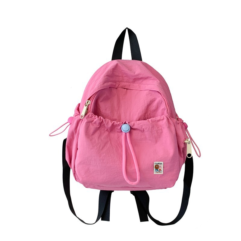 Coreana pequeña mochila fresca para niños y niñas, color macarón jardín de infantes, mochila para bebés, mochila de cuerda sólida para niños
