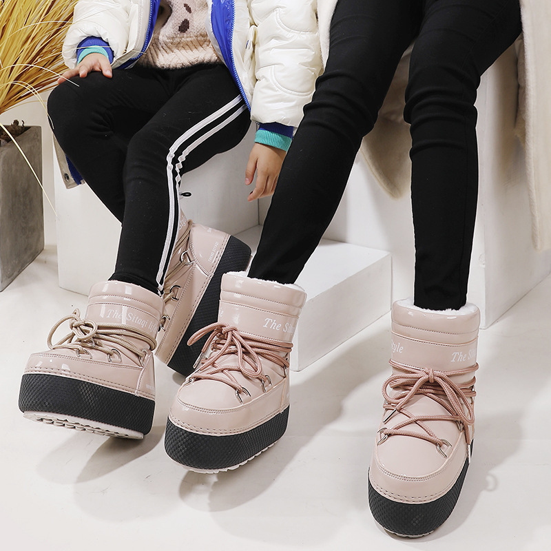 Las botas de esquí de té de arena de alta gama para padres e hijos de invierno son cálidas y fáciles de cuidar, seguras y de origen transfronterizo, dropshipping