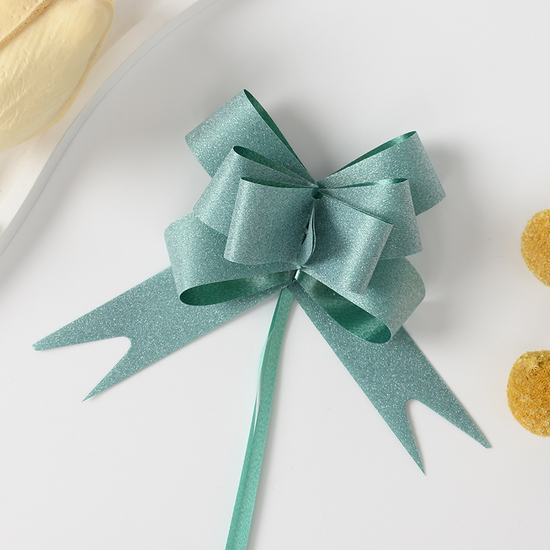 Nuevo 18 diamante cruzado macarón arco de cristal mano flores de Navidad regalos de flores embalaje de flores de dibujo