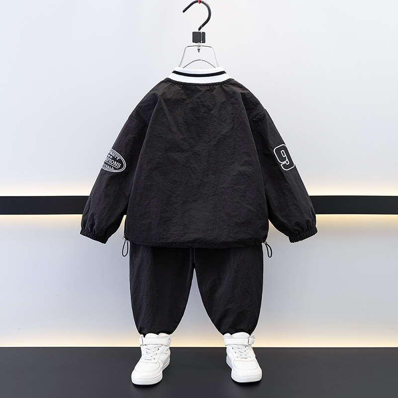 7693 Traje de ocio de herramientas para niños 2025 Primavera Nuevo estilo para niños pequeños y medianos Top de letras para bebés Pantalones de dos piezas