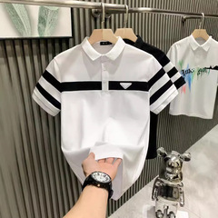 ヨーロッパの商品のネットの赤い爆発の白黒の縞の襟の軽い豪華な男のtシャツの半袖のpoloシャツの潮のブランドのごろつきのハンサムな百合の服