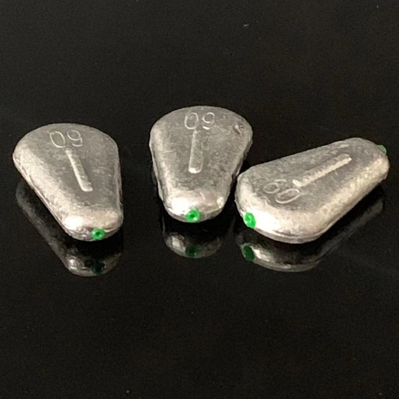 帶塑心防滑扁中空鉛墜漁具批發扁雞心釣魚鉛墜漁具配件中通鉛墜