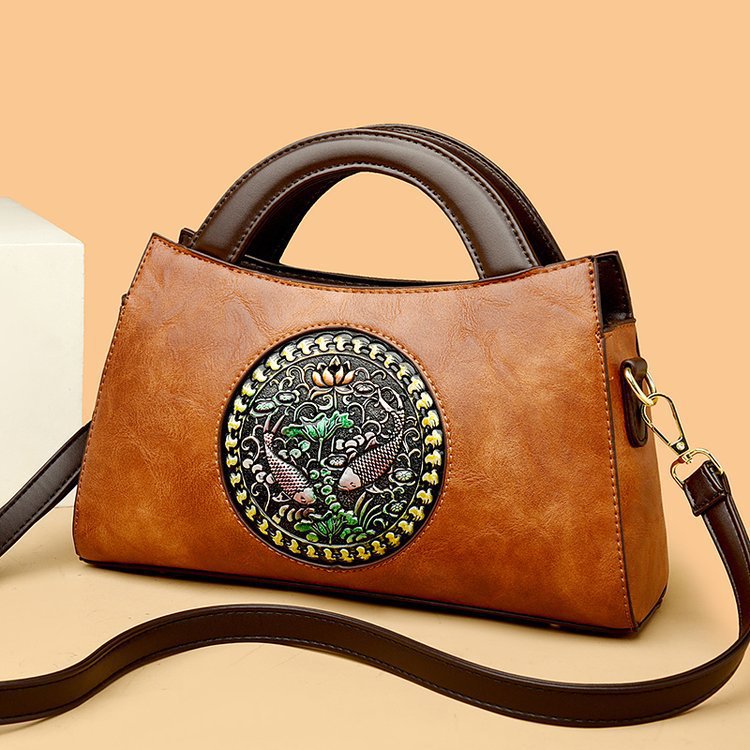 Bolso de mano de mujer mujer 2024 nueva moda atmósfera bolso de madres de mediana edad moda versátil simple bolsas de hombro