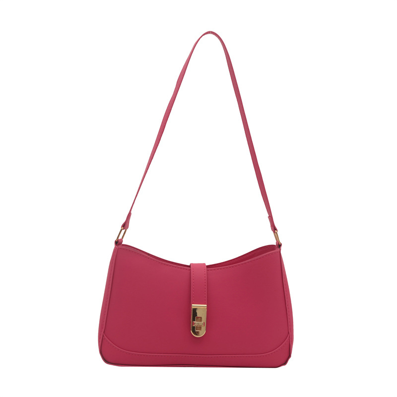 El popular diseño de nicho de este año 2024 nuevo bolso de mensajero de color sólido de moda bolso de hombro de moda bolso de axila con cerradura de estilo occidental