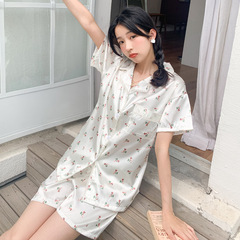 夏のパジャマの女性の半袖の半ズボンの襟のカーディガンの糸の家の服のスーツのネットの赤い金は実際にプリントの輪をいっぱいたたいて代行します。