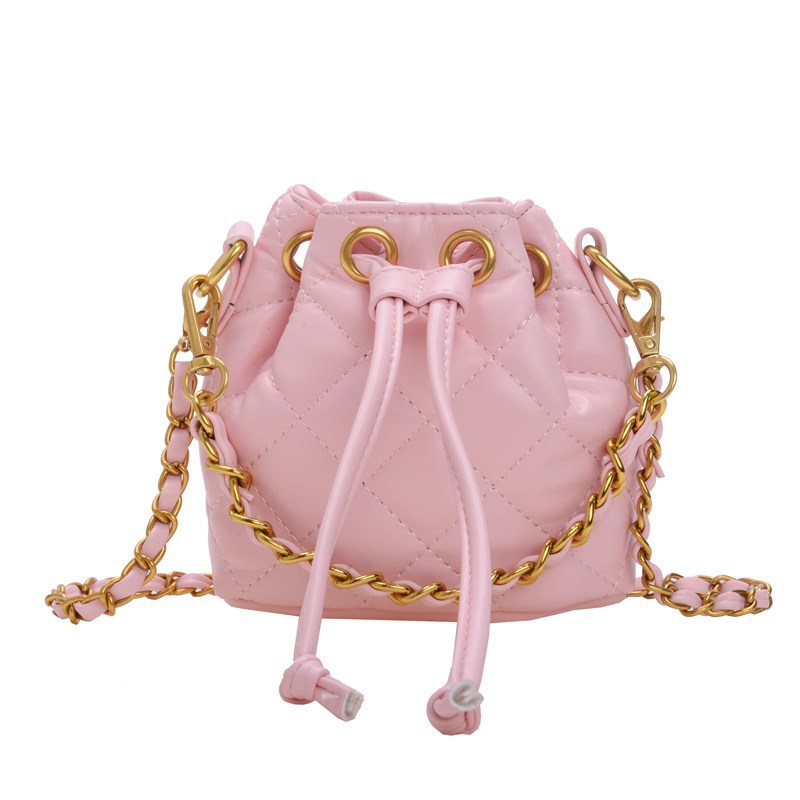 Bolso de hombro para niños y niñas Lingge de moda, cordón de aire extranjero, bolso de cubo de bebé de color sólido simple, nuevo bolso de cadena para niños