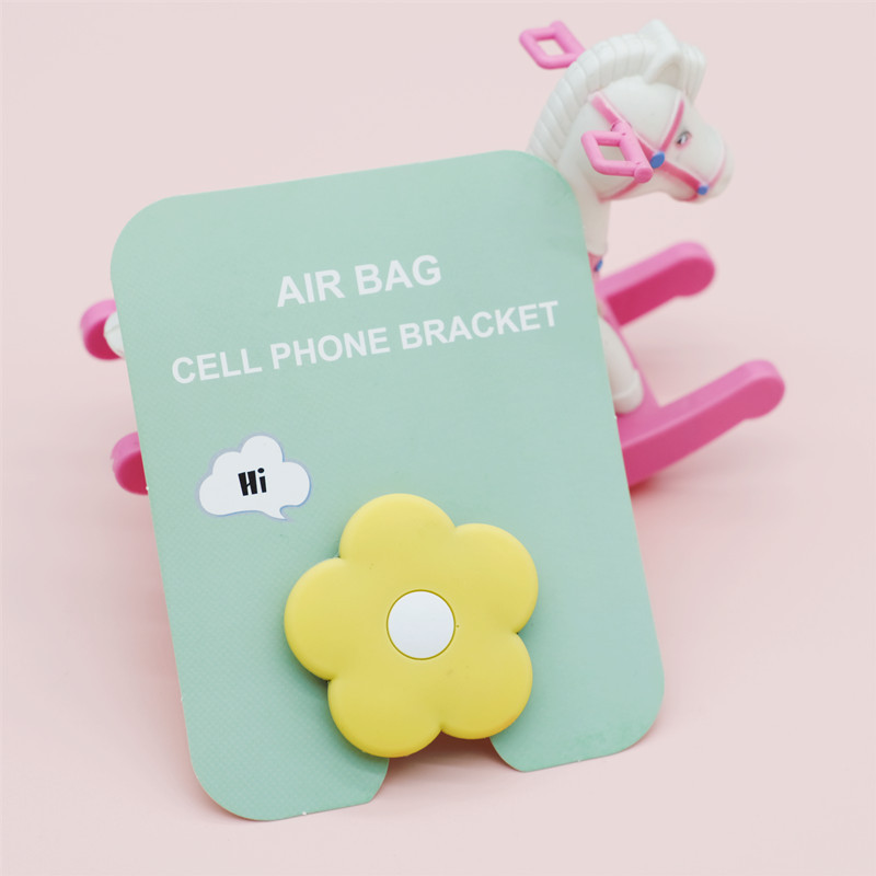 Airbag de dibujos animados soporte de teléfono móvil retráctil creativo personalizado escritorio plegable adhesivo perezoso soporte pequeño multifuncional
