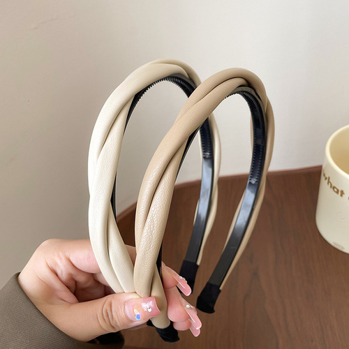 High-end leather twist headband female internet celebrity 2024 new high skull pressure hair headband hairpin retro headwear