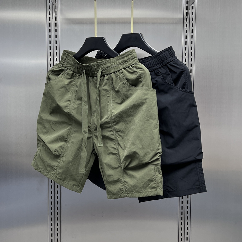 Marque de mode d'été vêtements de travail décontractés cinq trimestres 2024 nouveaux vêtements d'extérieur de sport pantalons de plage hommes grands shorts_voghion.com