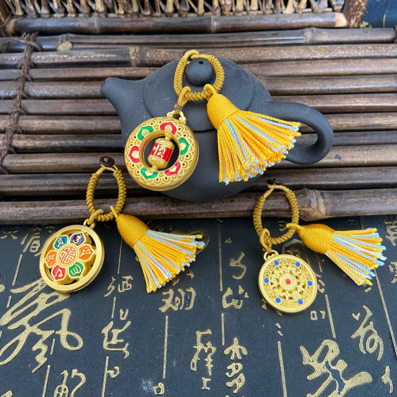 厂家直供新款经筒钥匙扣景区热卖六字真言包挂寺庙旅游纪念品批发