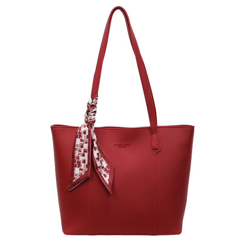 Bolso rojo de gran capacidad para mujeres versátil 2025 nuevo bolso de hombro casual simple para trabajar bolso de viaje