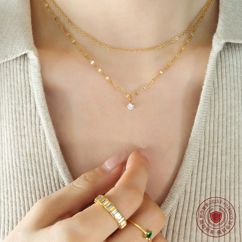 Estilo coreano ins diseño de nicho simple collar de circón apilado de doble capa collar de clavícula de acero de titanio para las mujeres