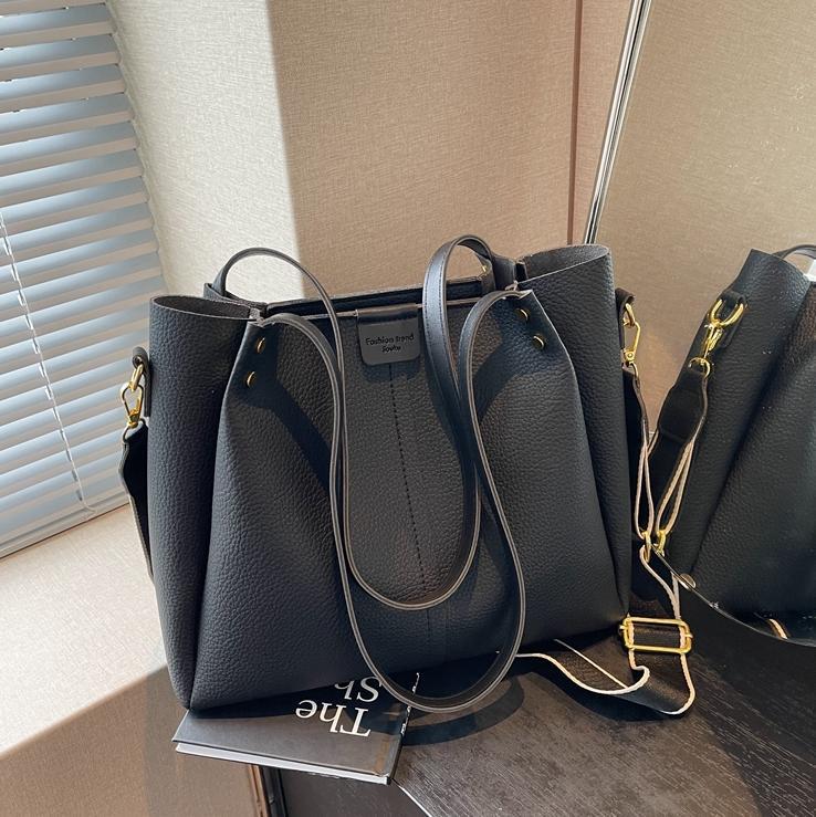 Bolsas de gran capacidad de explosión transfronteriza para mujeres 2025, nuevas bolsas de mochila versátiles, bolsas de cubo casuales simples.