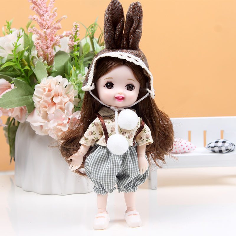 17 cm caja de regalo conjunto de marea constante muñeca Barbie muñeca muñeca cambiante articulaciones muñeca estand móvil