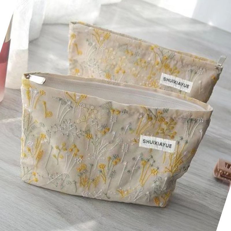 Retro literatura elegante portátil bolsas de maquillaje 2024 nuevo bolsas de maquillaje original nicho diseño mayorista