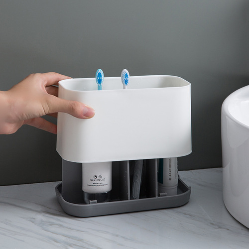 Creative toothbrush and toothpaste storage rack bathroom bathroom storage rack desktop washbasin makeup brush comb storage box