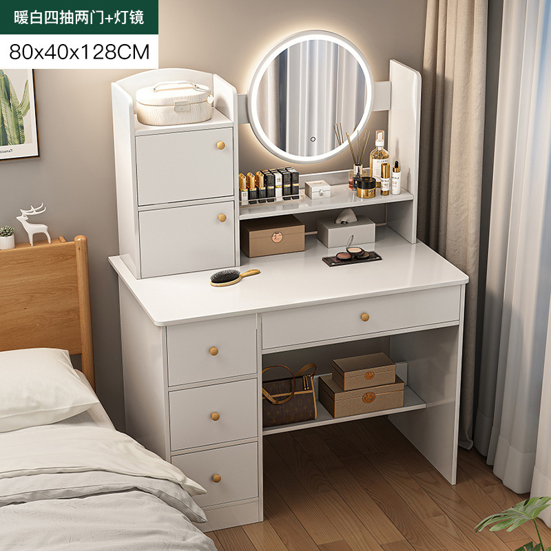 Tocador para dormitorios pequeños, sencillo y moderno, con gabinete de almacenamiento integrado, mini escritorio de maquillaje para apartamentos pequeños.