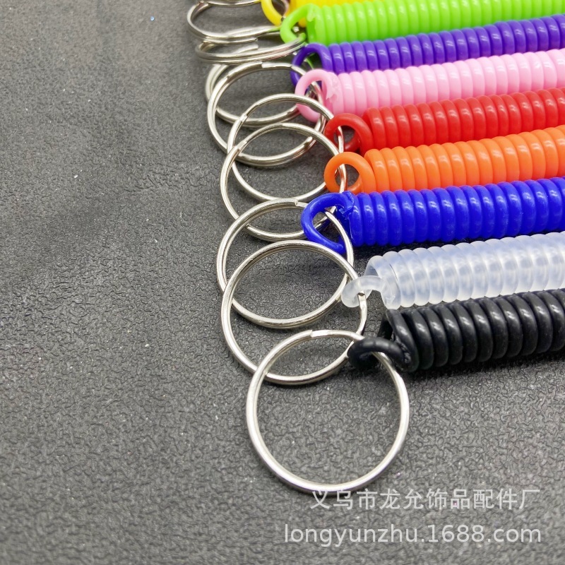 キャンディー色の高弾プラスチックは電話線のスプリングロープのキーチェーンをなくして携帯電話のカードカバーストラップのキーチェーンを包みます。|undefined