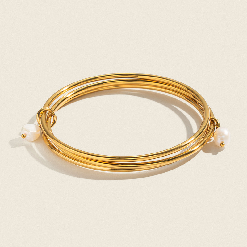 Xia Ling's minimalist layered freshwater pearl three-layer bracelet for women, niche design, 18K gold stainless steel European and American jewelry