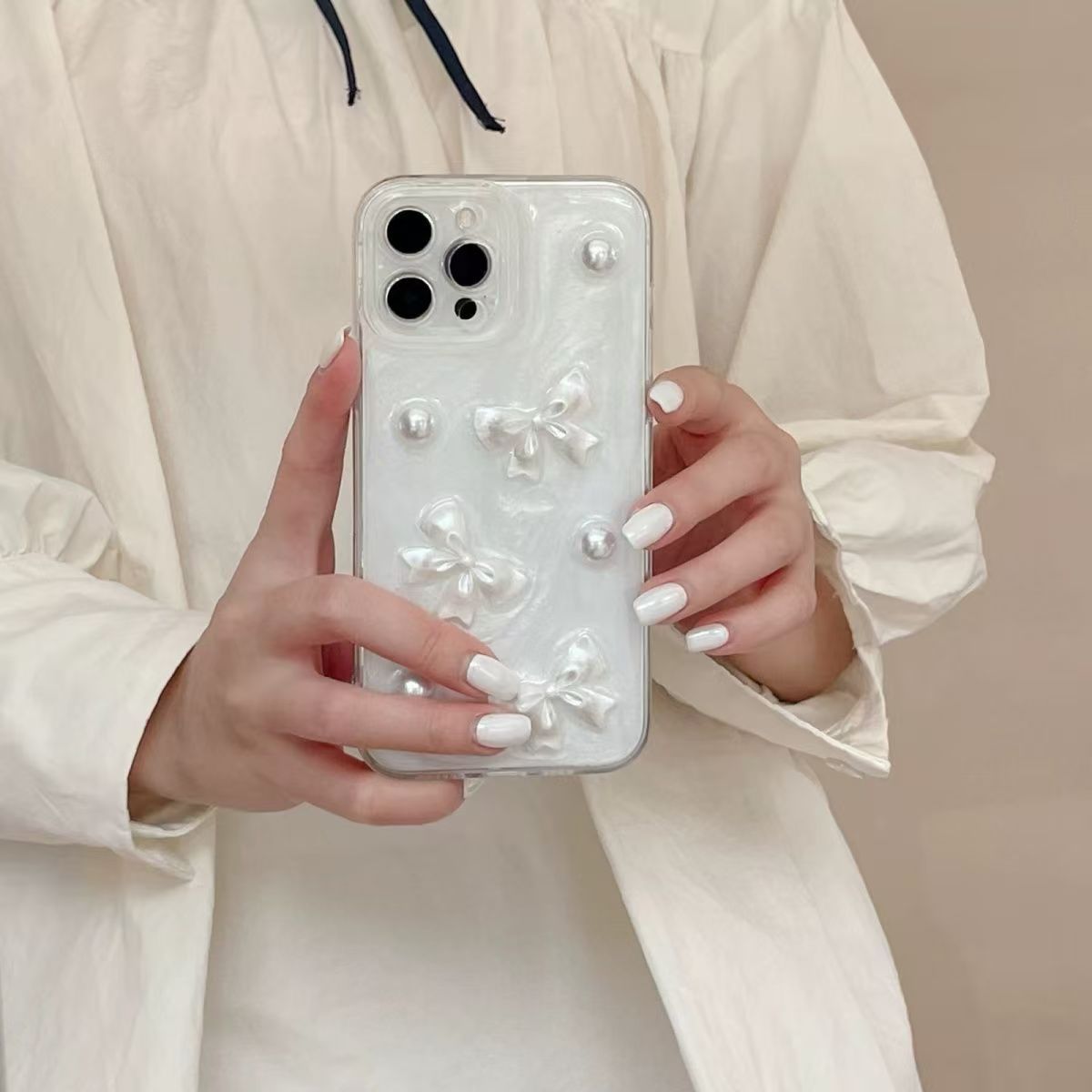 Arco de perla de crema de alta calidad para soporte de teléfonos móviles de Apple Huawei antideslizante image 3
