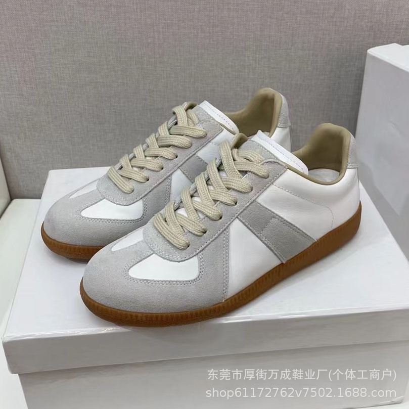 Zapatos de entrenamiento alemanes originales puros mm6 zapatos casuales deportivos planos de cuero para mujer zapatillas de deporte para hombre zapatos blancos ventas directas de fábrica de Dongguan