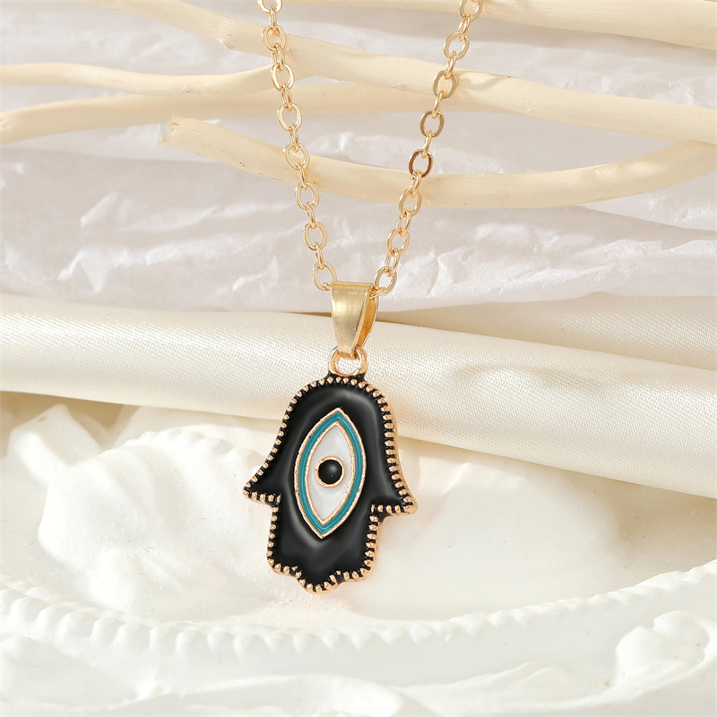 Retro Alloy Black Devil Eyes Palm Earrings Necklace Set