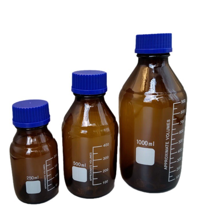 茶色の丸型ネジ蓋付き青蓋化学試薬瓶、厚みのある目盛り付き密封実験用低ホウ素シリカガラス水溶液瓶|undefined