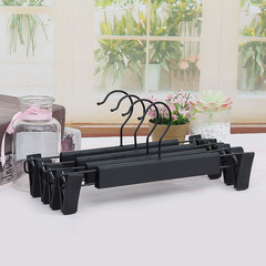 Anti-slip black sandpaper plastic trouser clips for strong, invisible clothing store use, hanger trouser and skirt clips, factory wholesale
